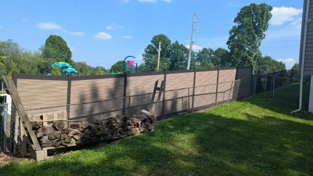 Racked grey aluminum fence