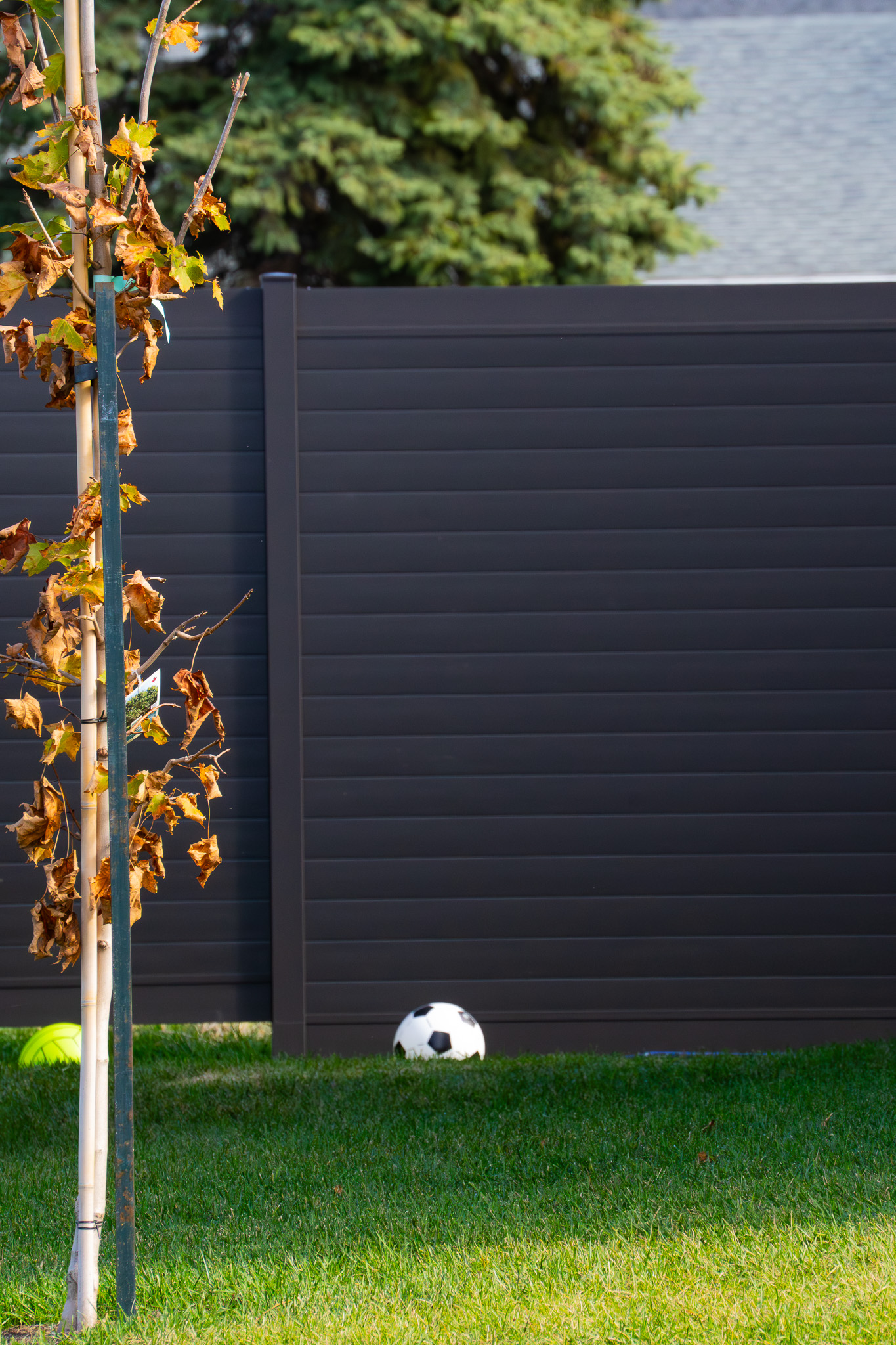Aluminum fence installation showing matching panel system components