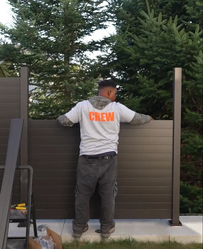 fence installer installing privacy fence